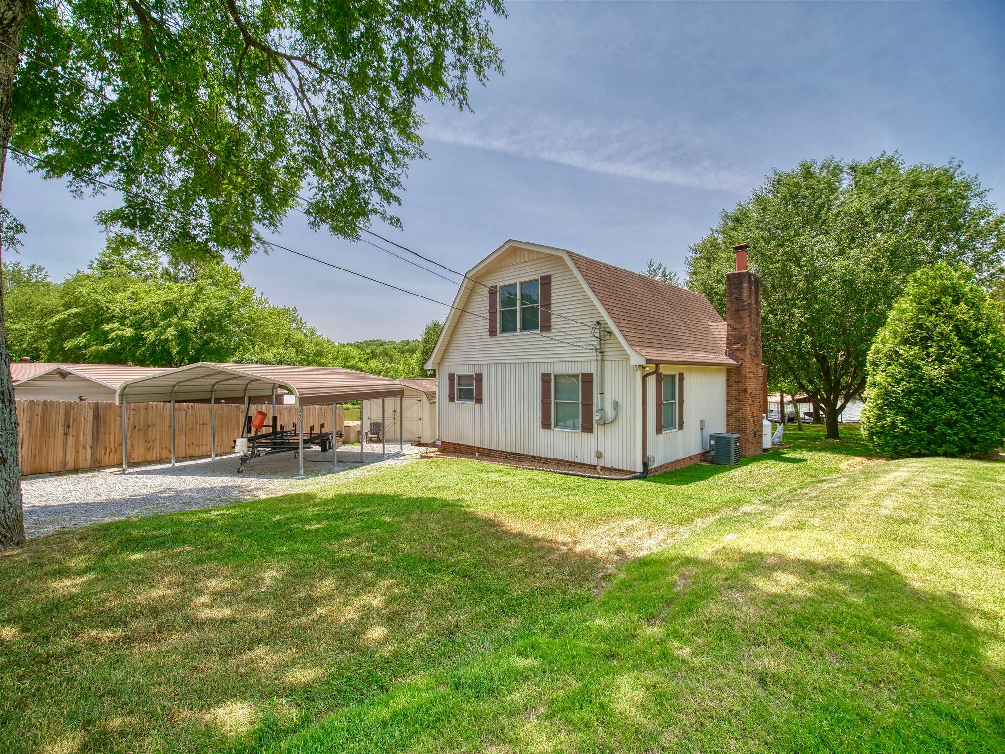 690 Ramsey Road Lebanon, TN 37087 - Photo 5 of 30 a view of a house with a yard and sitting area