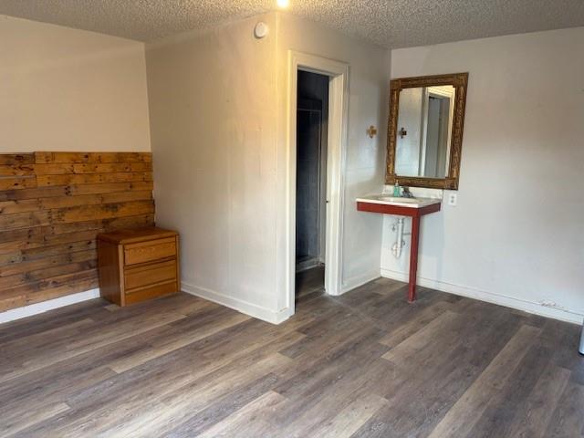 2070 Highway 69, Unit 1 Denison, TX 75020 - Photo 3 of 3 wooden floor in a hall with a window