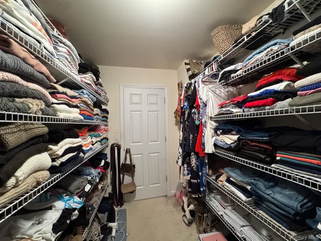 a view of a storage room with furniture