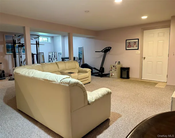a living room with furniture and a couch