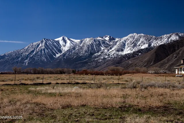 a view of a lake with mountain in the background