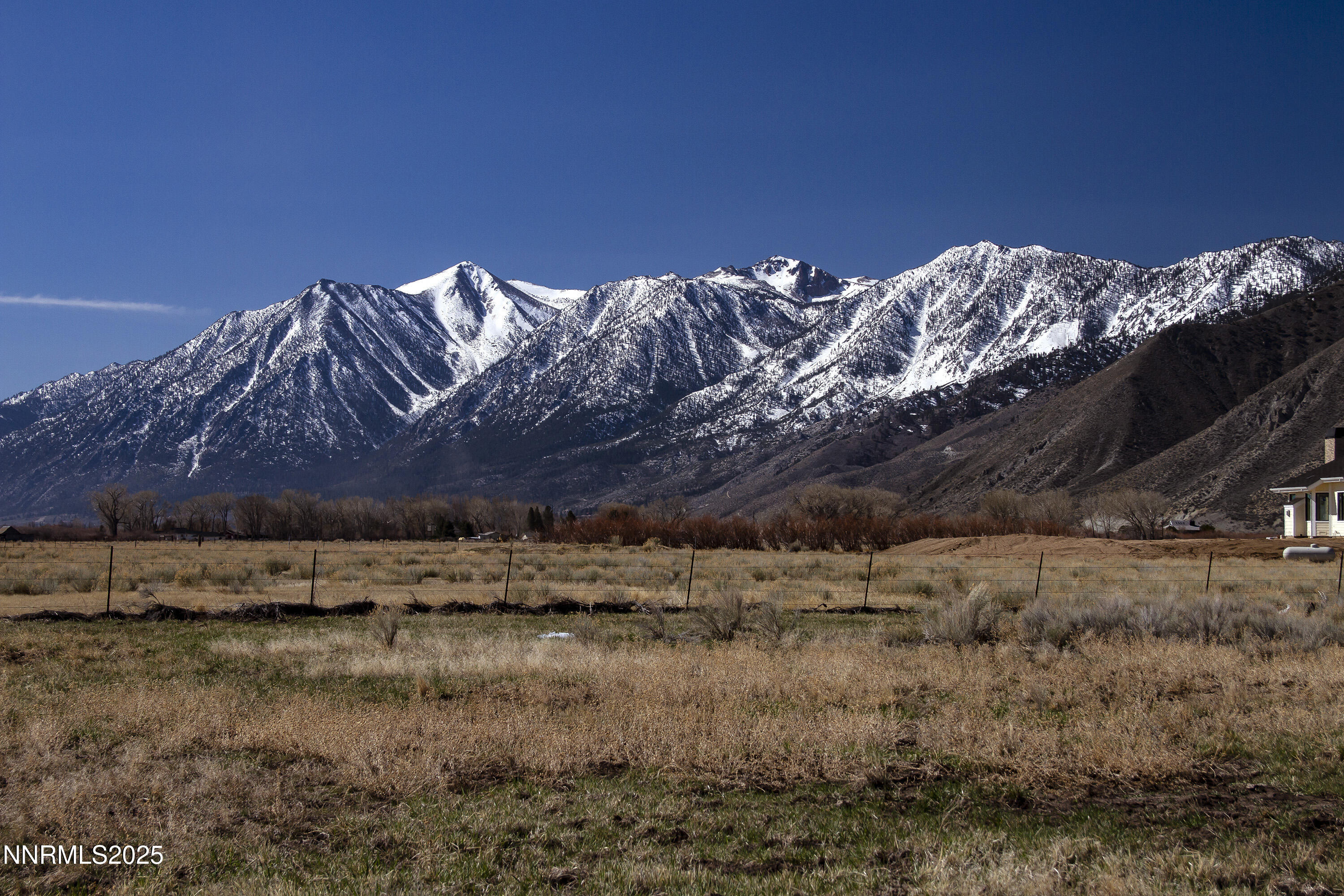a view of a lake with mountain in the background