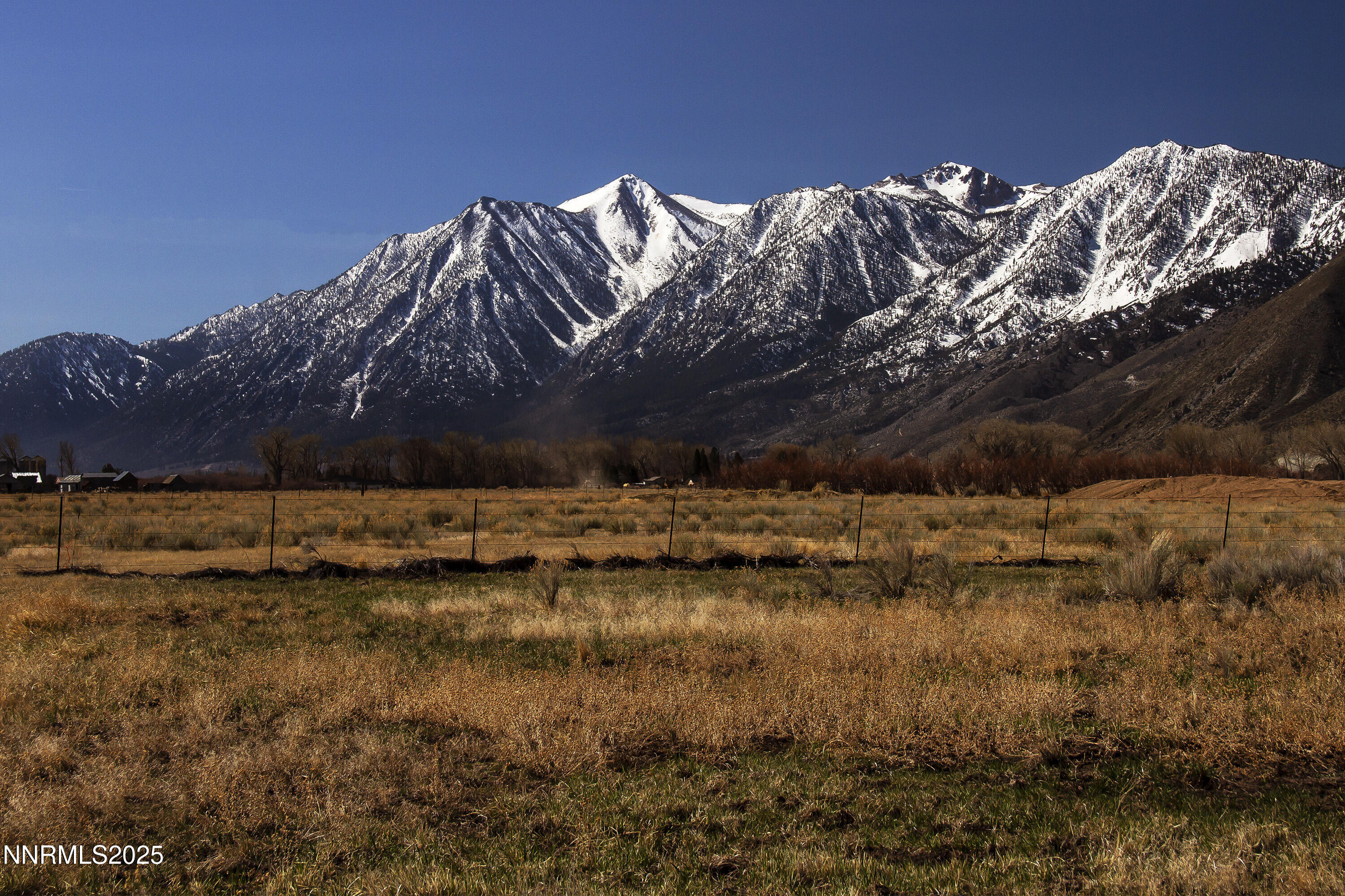 4 Deerhaven Genoa, NV 89411 - Photo 2 of 26 a view of a large body of water with a mountain