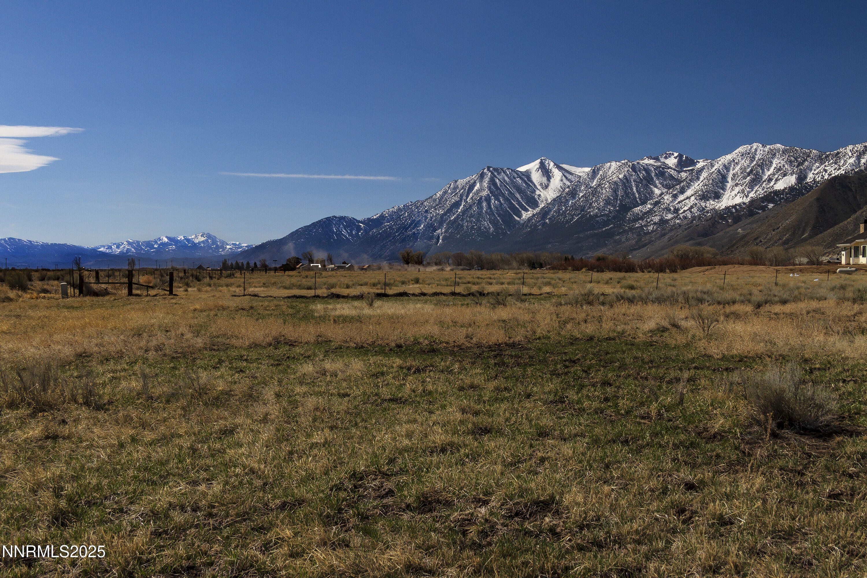 4 Deerhaven Genoa, NV 89411 - Photo 3 of 26 a view of a large body of water with a mountain in the background