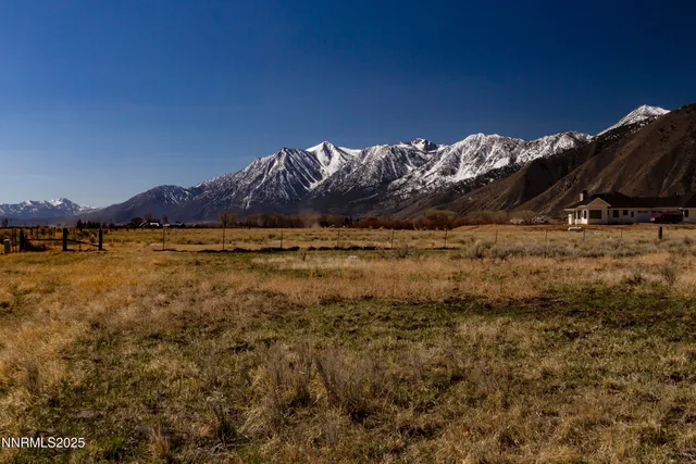 a view of a lake with mountain in the background