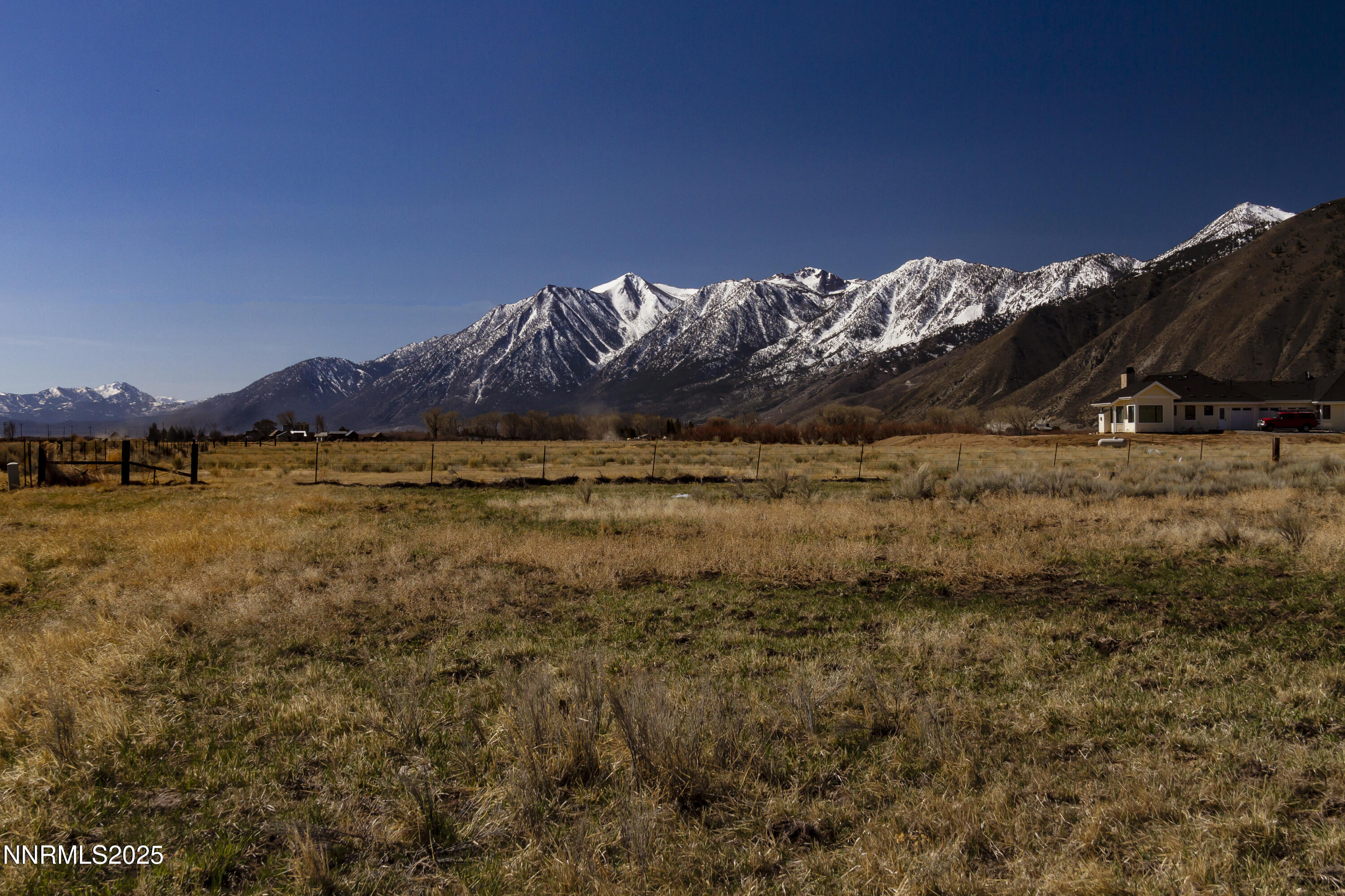 4 Deerhaven Genoa, NV 89411 - Photo 7 of 26 a view of a lake with mountain in the background