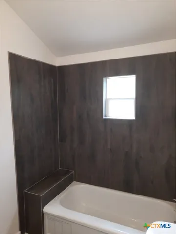 a bathroom with a bathtub