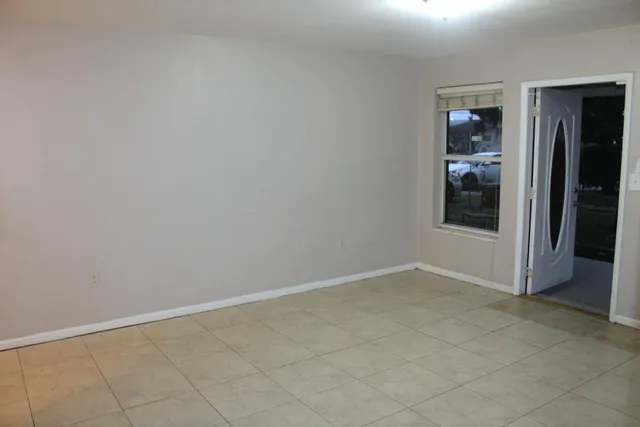 a kitchen with stainless steel appliances a white stove top oven and sink