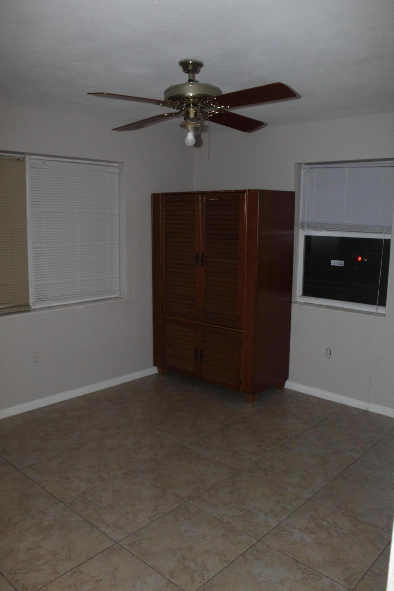 4434 Venus Avenue, Unit A West Palm Beach, FL 33406 - Photo 8 of 9 a view of an empty room