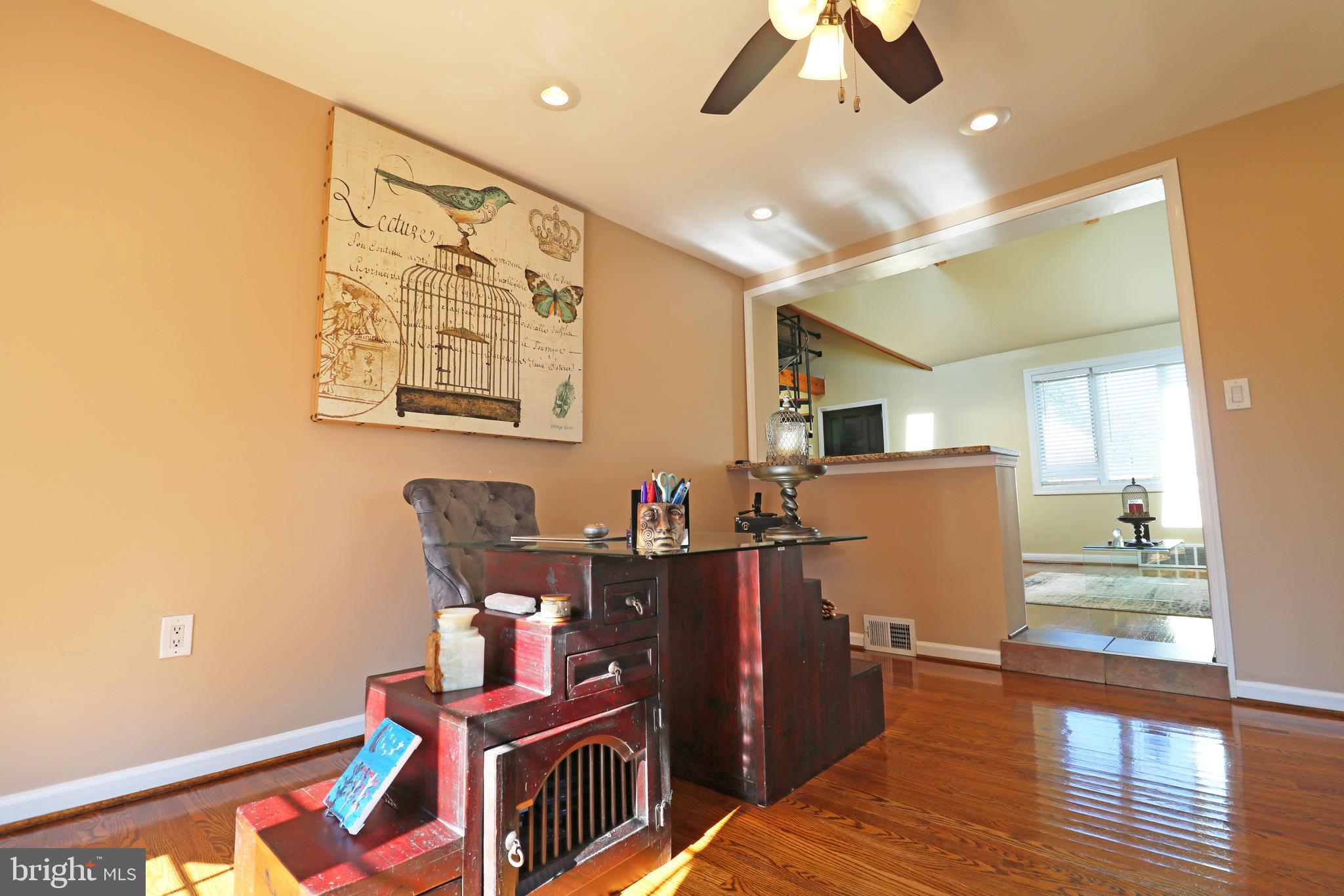 29 Pleasant Road Broomall, PA 19008 - Photo 13 of 46 a room with furniture and wooden floor