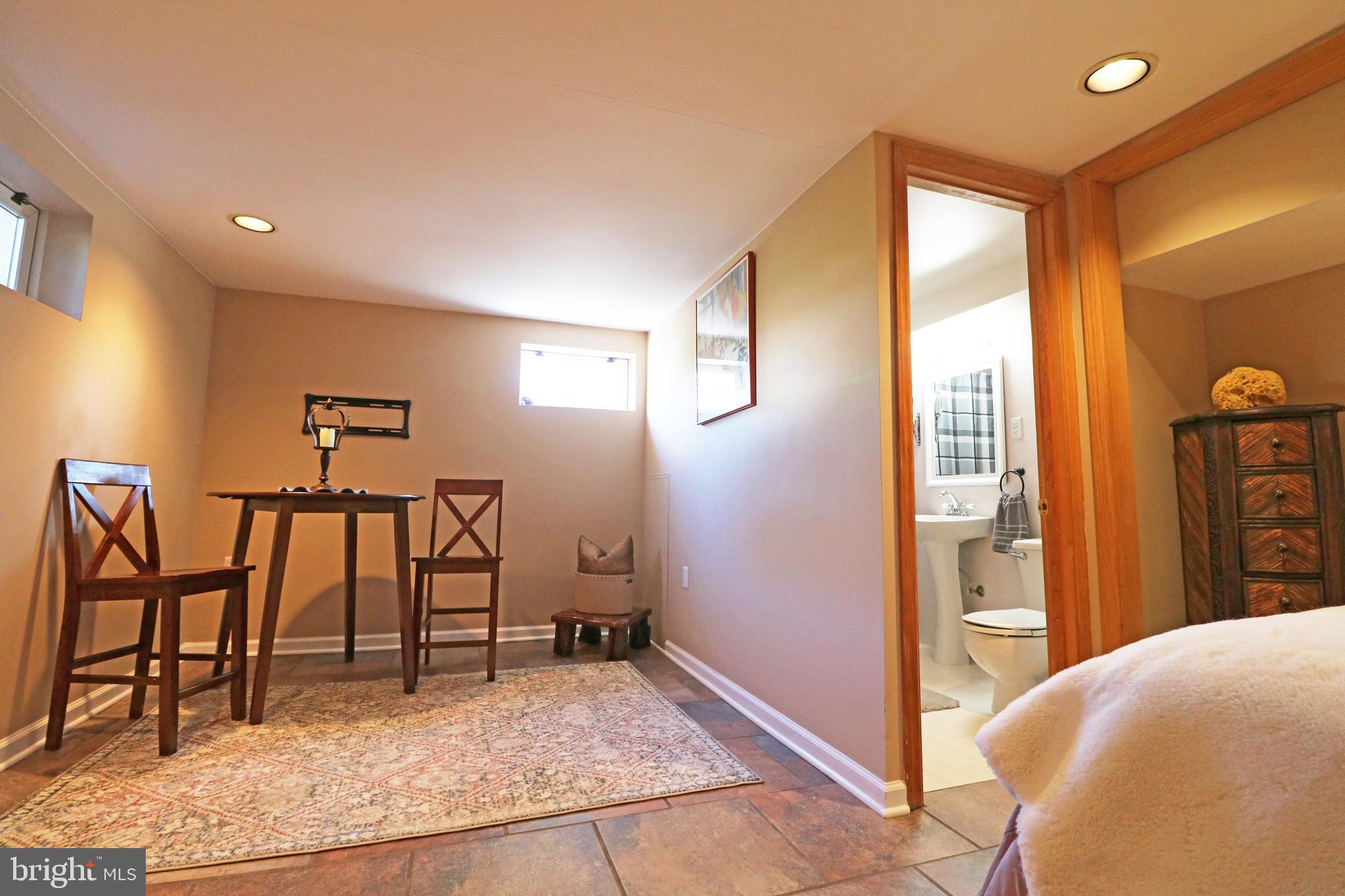 29 Pleasant Road Broomall, PA 19008 - Photo 28 of 46 a view of a livingroom with furniture and staircase