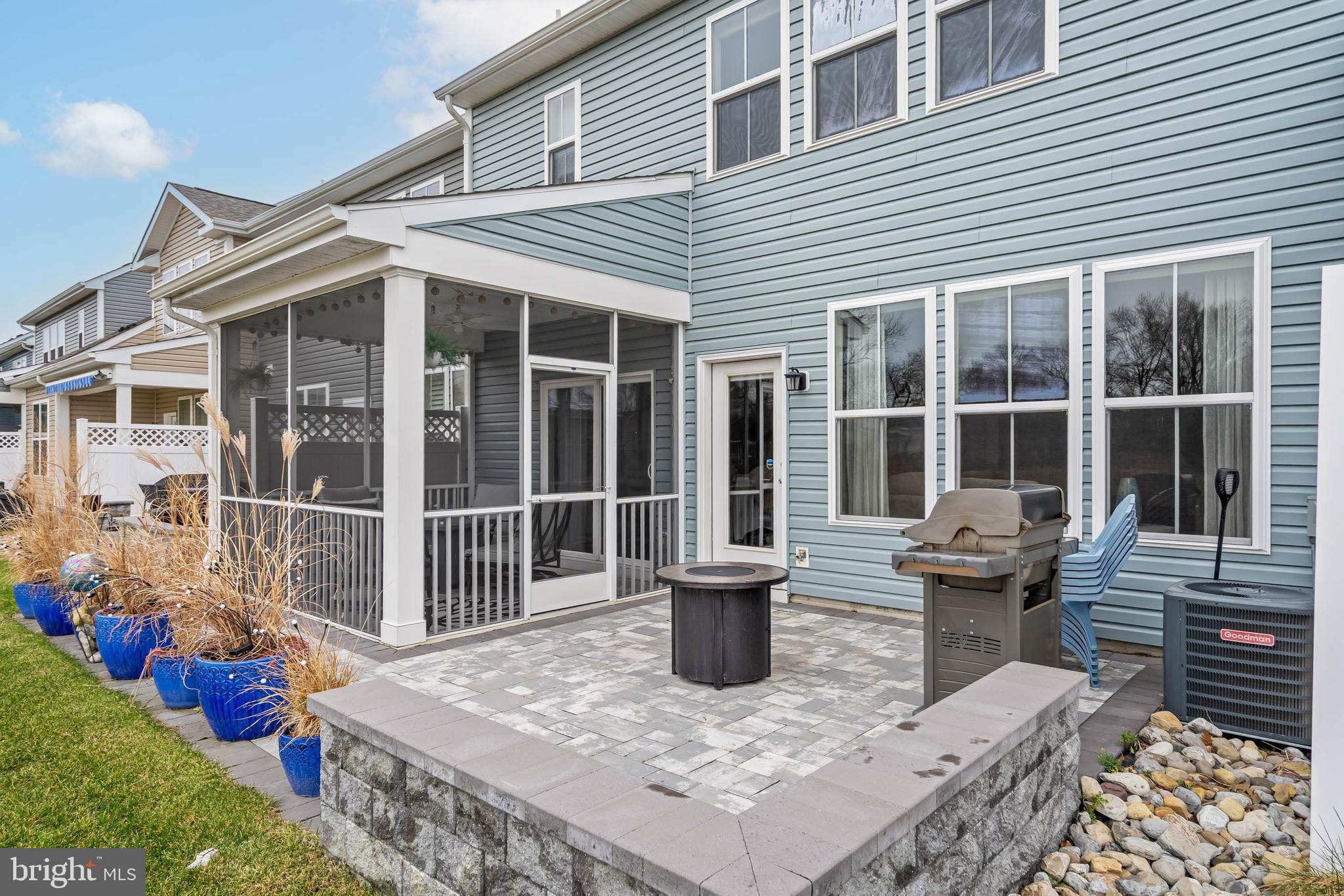 38053 Cross Gate Road Millville, DE 19967 - Photo 6 of 47 Paver Patio & Screened Porch