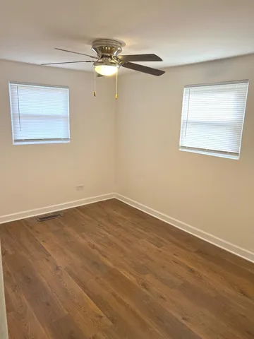 a view of a room that has a window in it