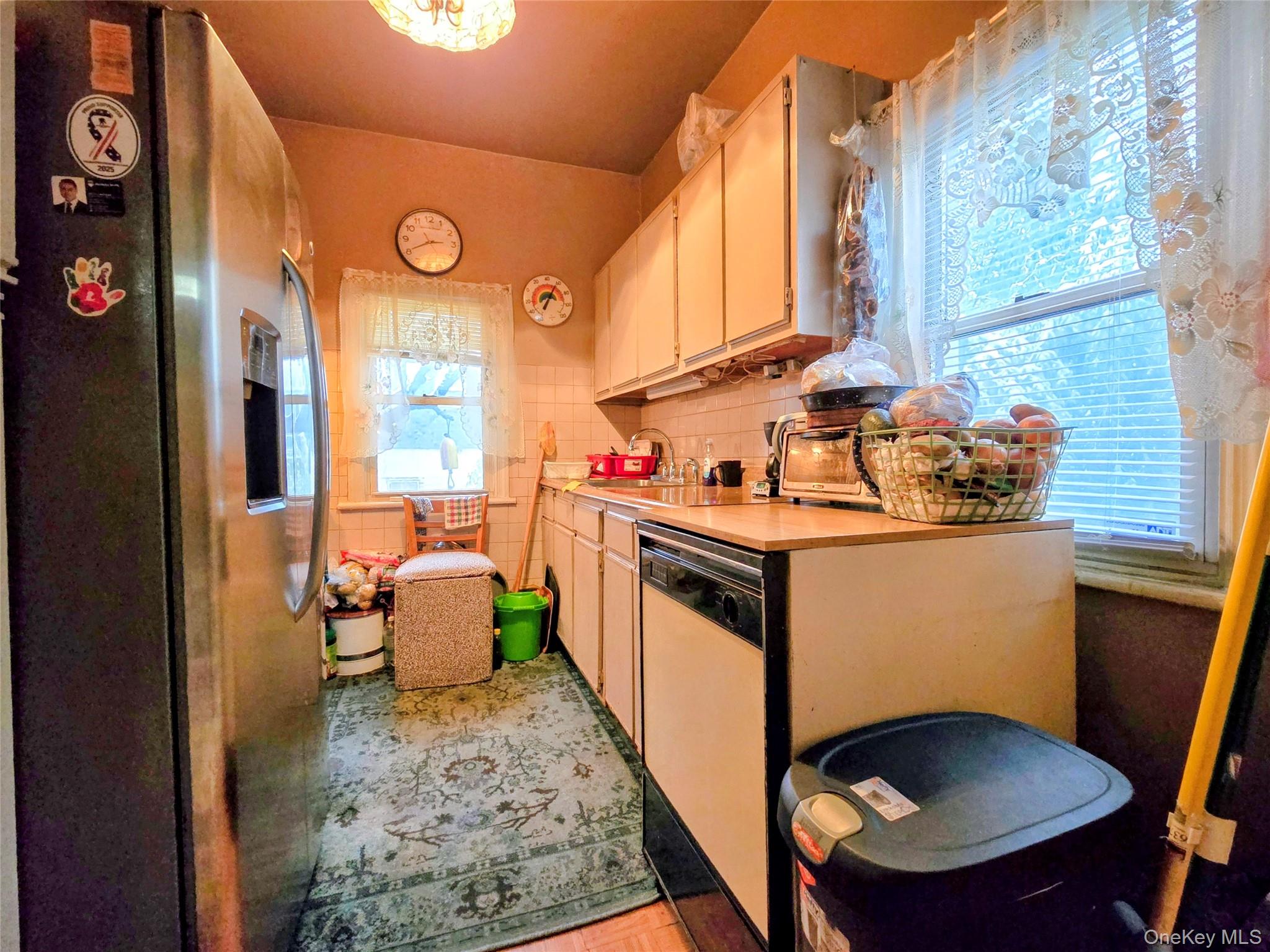 97 Hawkins Street Bronx, NY 10464 - Photo 11 of 20 a kitchen that has a sink and a stove