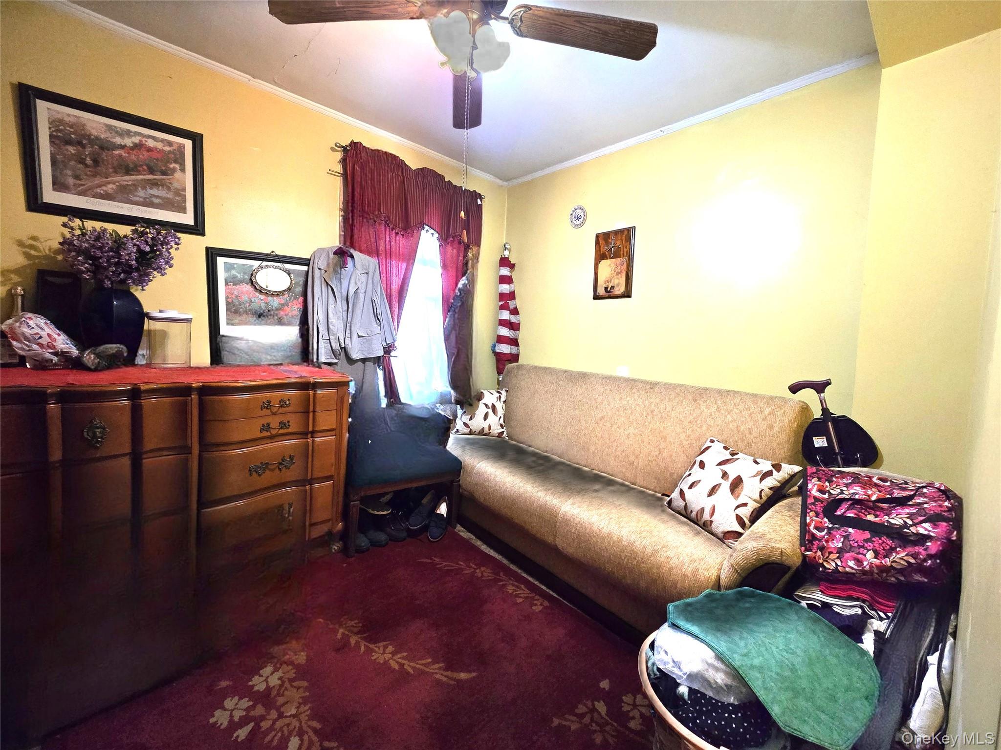 97 Hawkins Street Bronx, NY 10464 - Photo 13 of 20 a living room with furniture and a flat screen tv