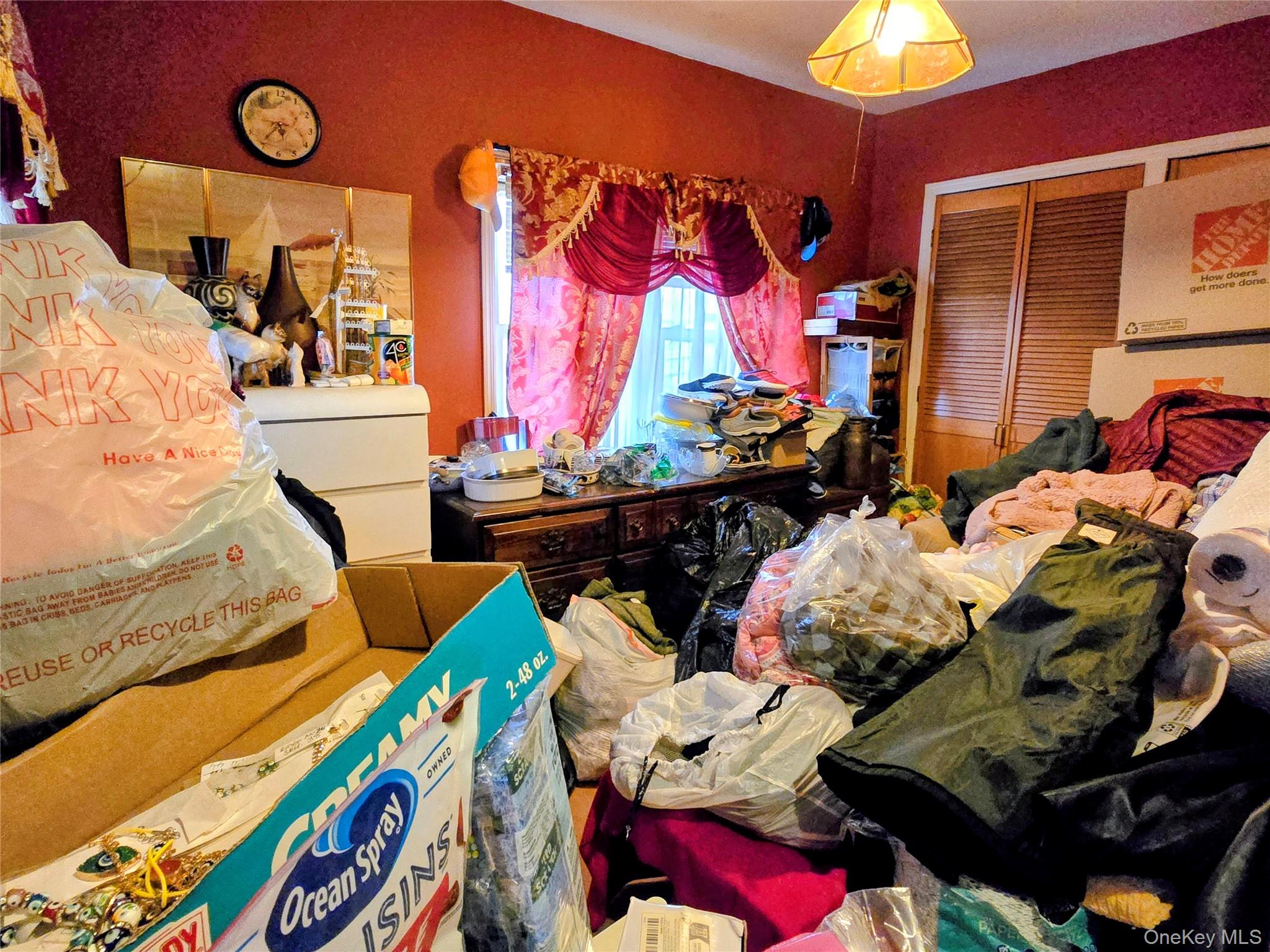 97 Hawkins Street Bronx, NY 10464 - Photo 19 of 20 a bed room with a bed and a couch