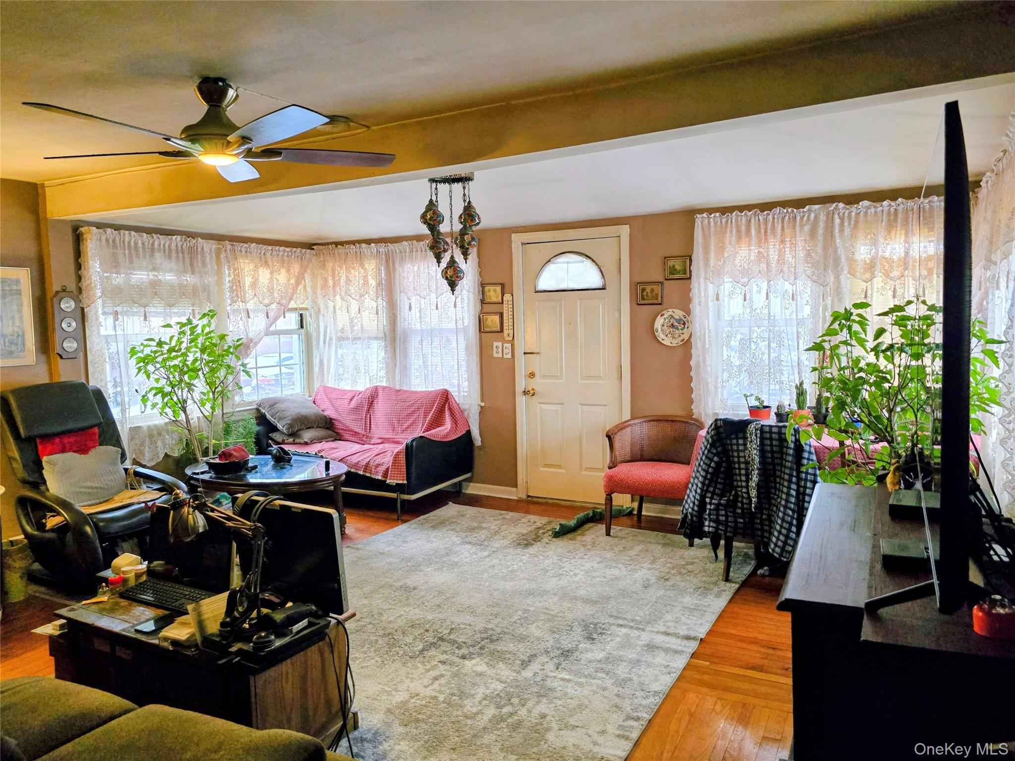 97 Hawkins Street Bronx, NY 10464 - Photo 6 of 20 a room with furniture and a potted plant