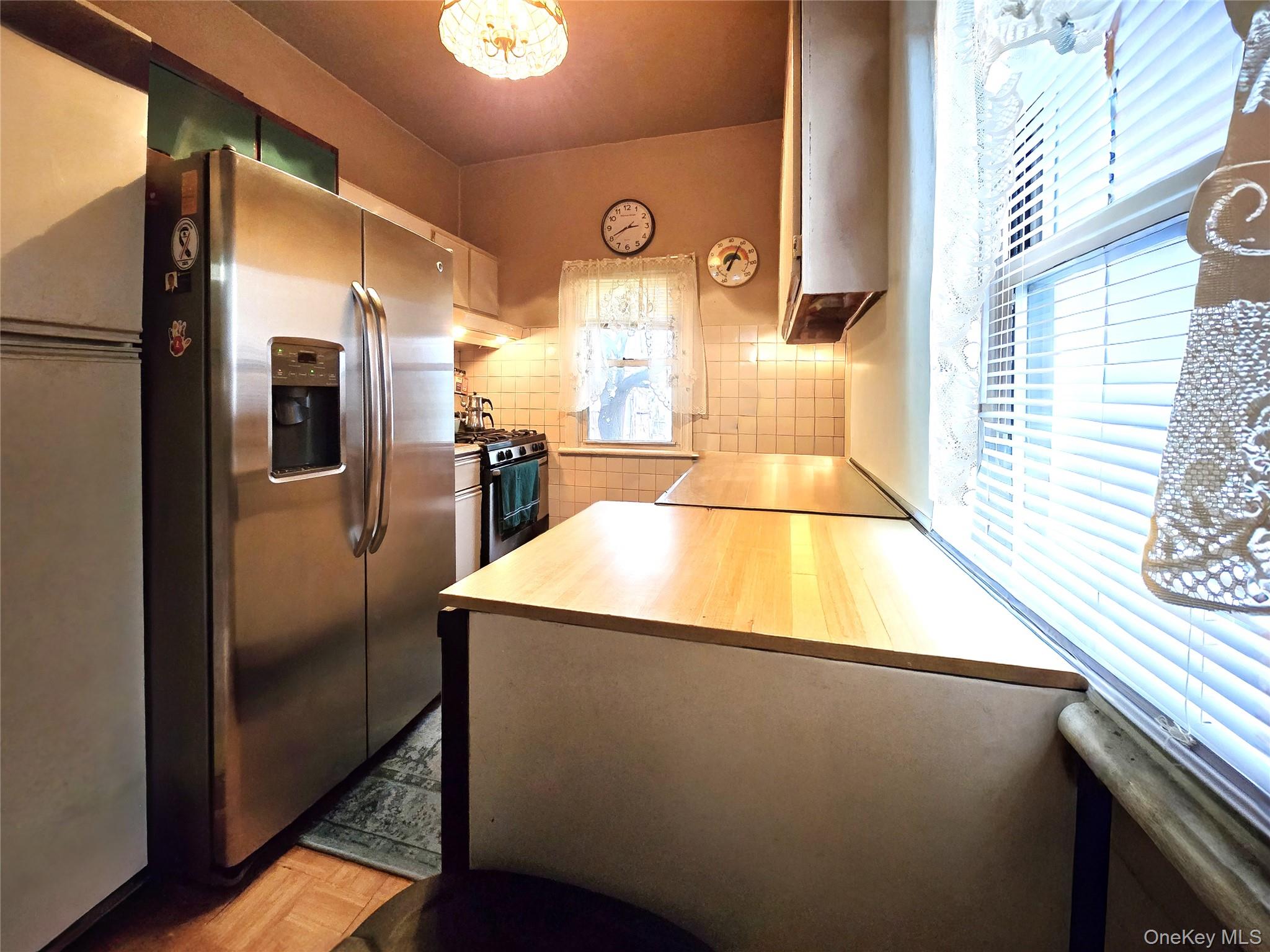 97 Hawkins Street Bronx, NY 10464 - Photo 9 of 20 a view of a refrigerator in a kitchen