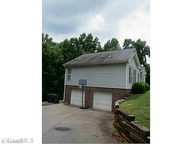 110 Aaron Road Elkin, NC 28621 - Photo 2 of 16 Parking Lot/Garage. Nice paved drive with two car garage.