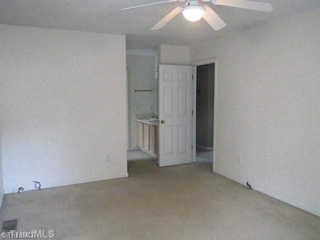 110 Aaron Road Elkin, NC 28621 - Photo 12 of 16 Master Bedroom. Master bedroom looking toward master bath.