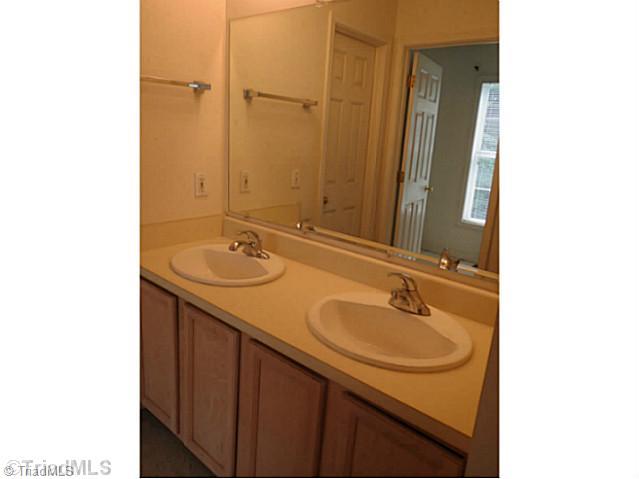 110 Aaron Road Elkin, NC 28621 - Photo 13 of 16 Master Bath/Spa. Master bath features vanity with double sinks.