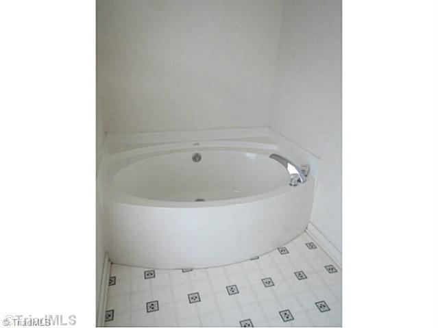 110 Aaron Road Elkin, NC 28621 - Photo 14 of 16 Master Bath/Spa. Master bath features garden tub.
