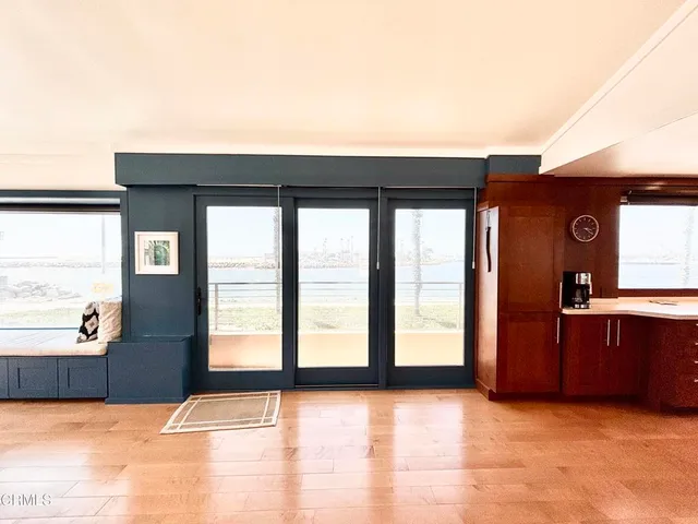 a view of a living room with a large window