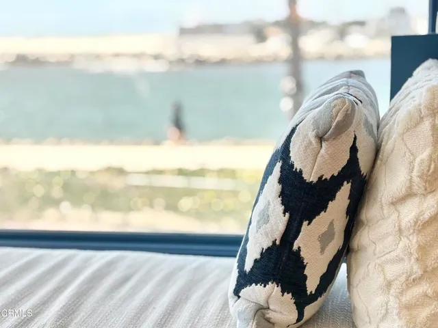 a view of balcony with furniture