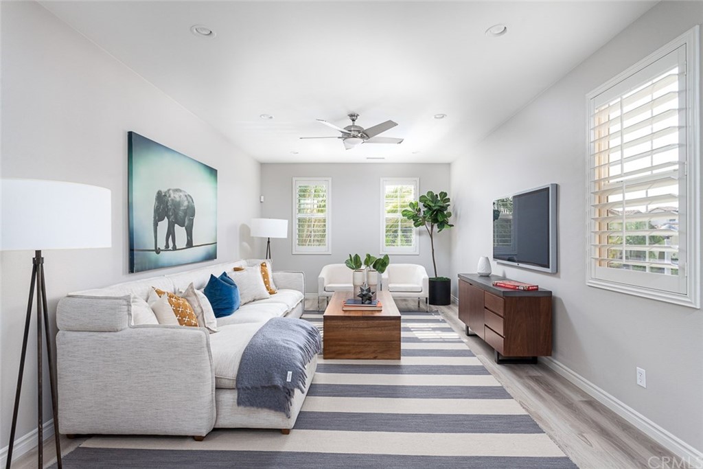 3932 Killymoon Circle Yorba Linda, CA 92886 - Photo 16 of 25 a living room with furniture and a flat screen tv