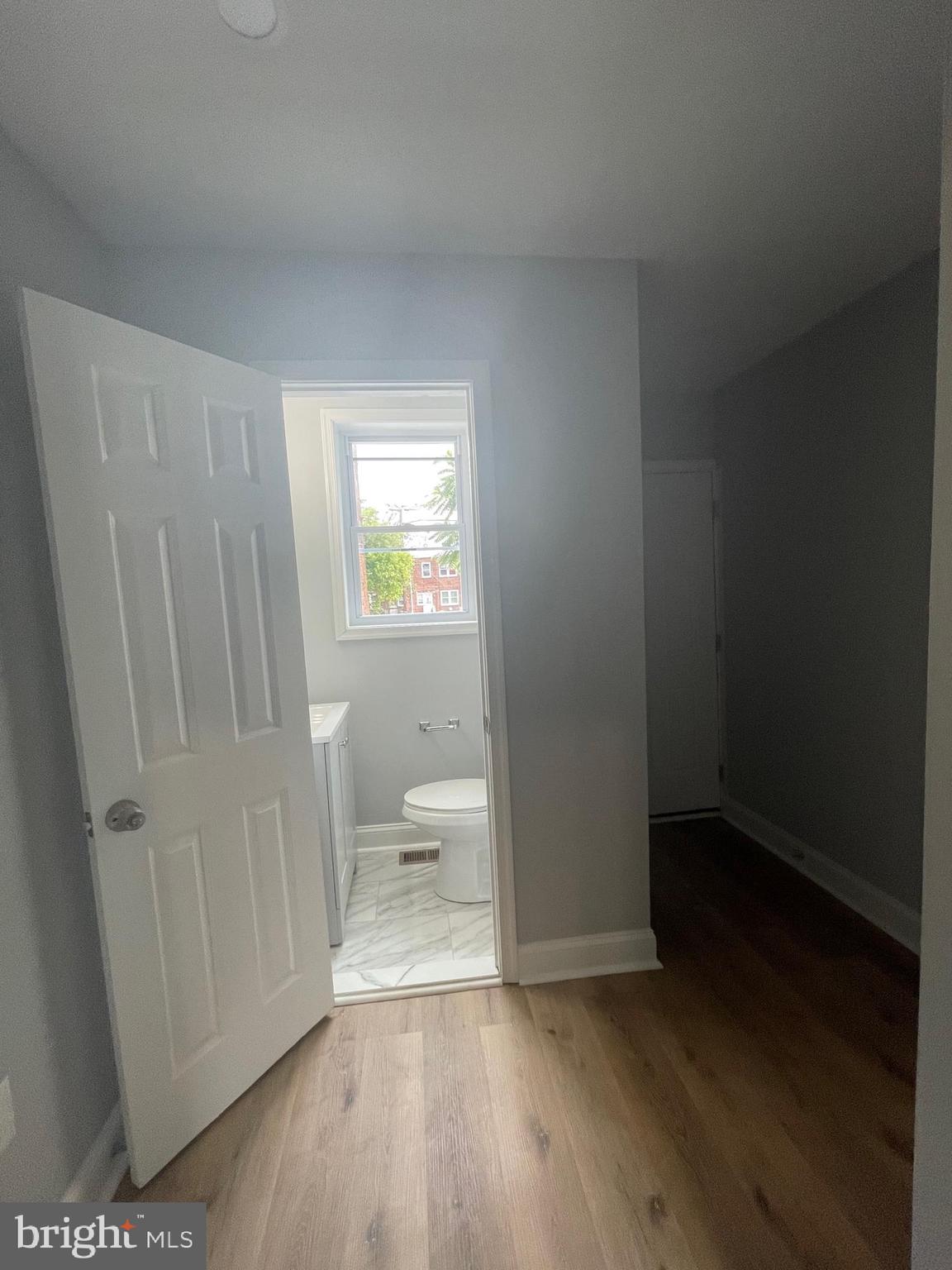 3619 Manchester Avenue Baltimore, MD 21215 - Photo 14 of 33 a view of a bathroom with wooden floor