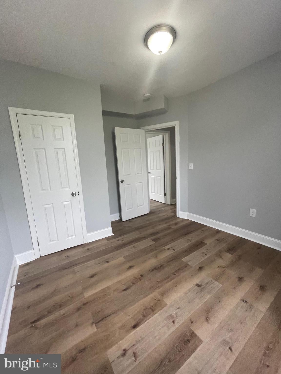 3619 Manchester Avenue Baltimore, MD 21215 - Photo 28 of 33 wooden floor in an empty room