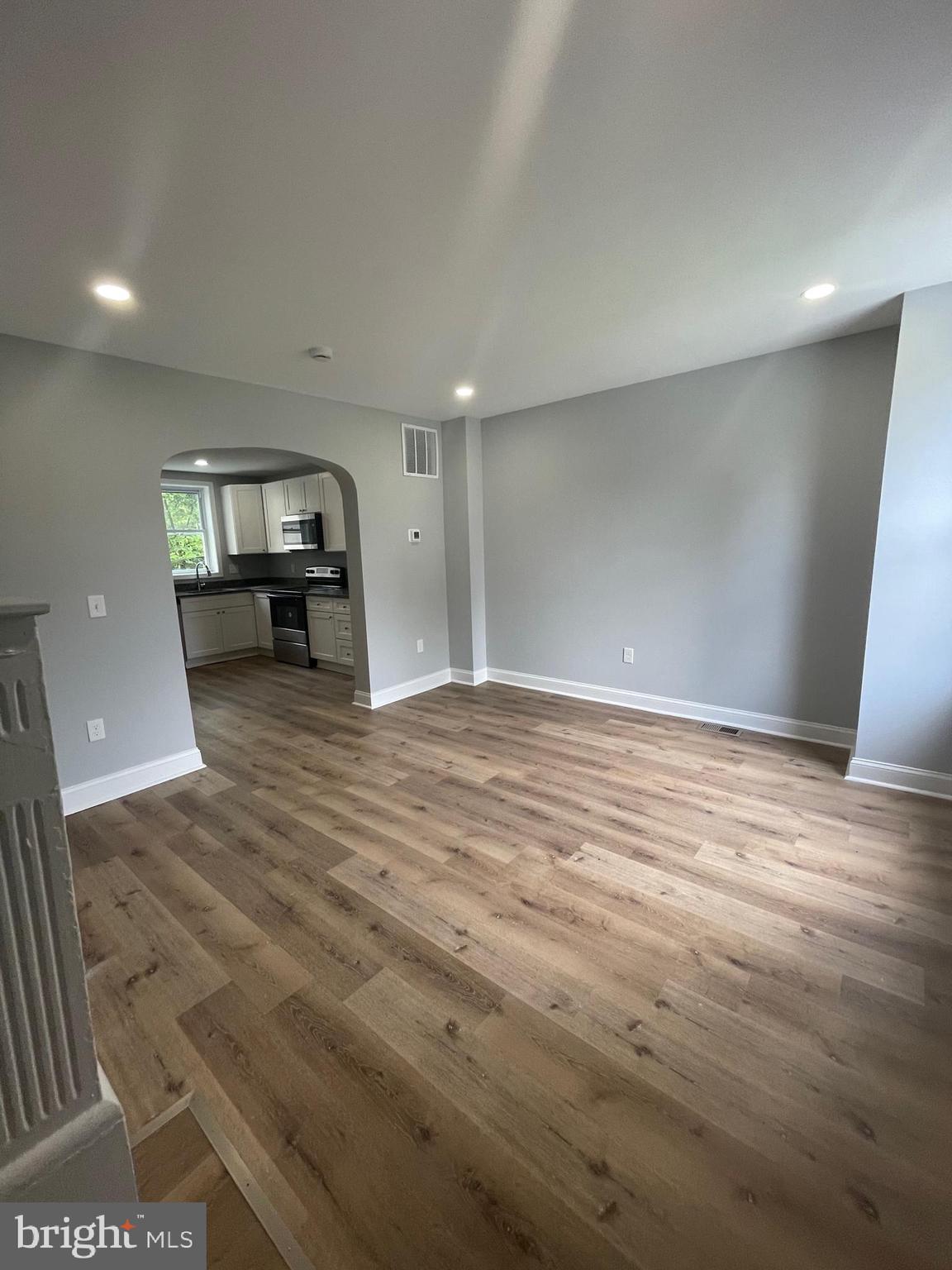 3619 Manchester Avenue Baltimore, MD 21215 - Photo 4 of 33 a view of a livingroom with a couch