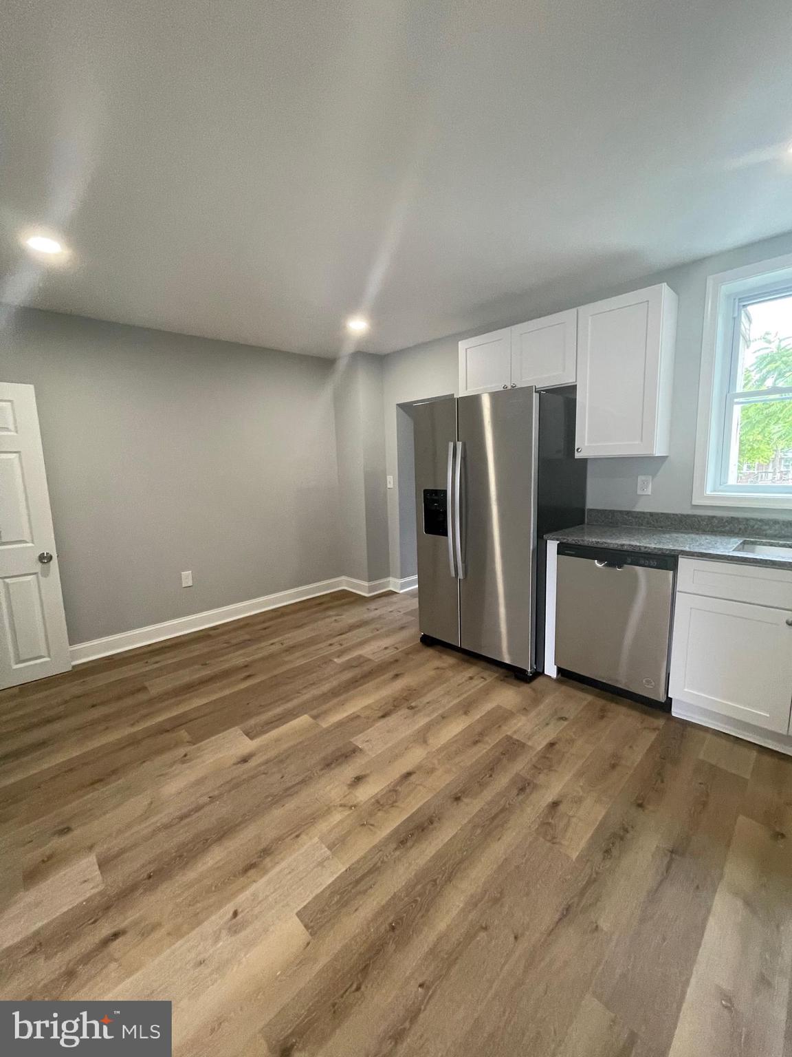 3619 Manchester Avenue Baltimore, MD 21215 - Photo 8 of 33 a view of a kitchen with a sink cabinets and a window
