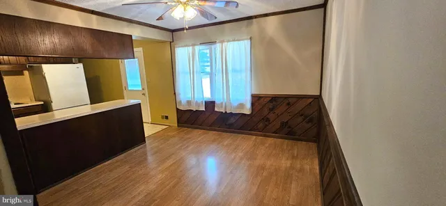 a view of livingroom with furniture and chandelier