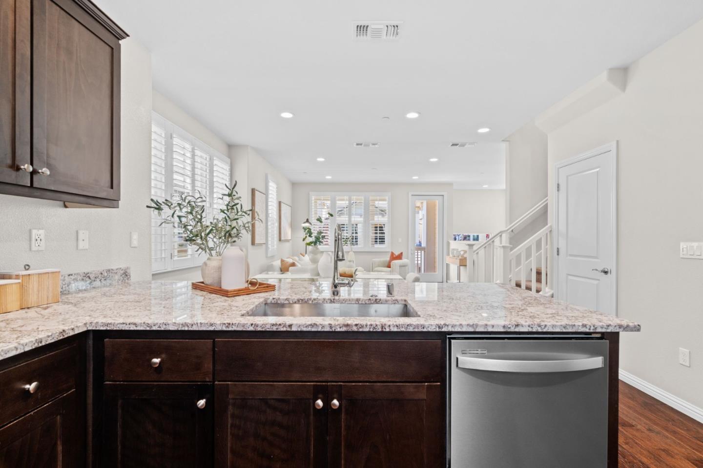 3406 Pyramid Way Mountain View, CA 94043 - Photo 11 of 41 a kitchen with granite countertop a sink and cabinets