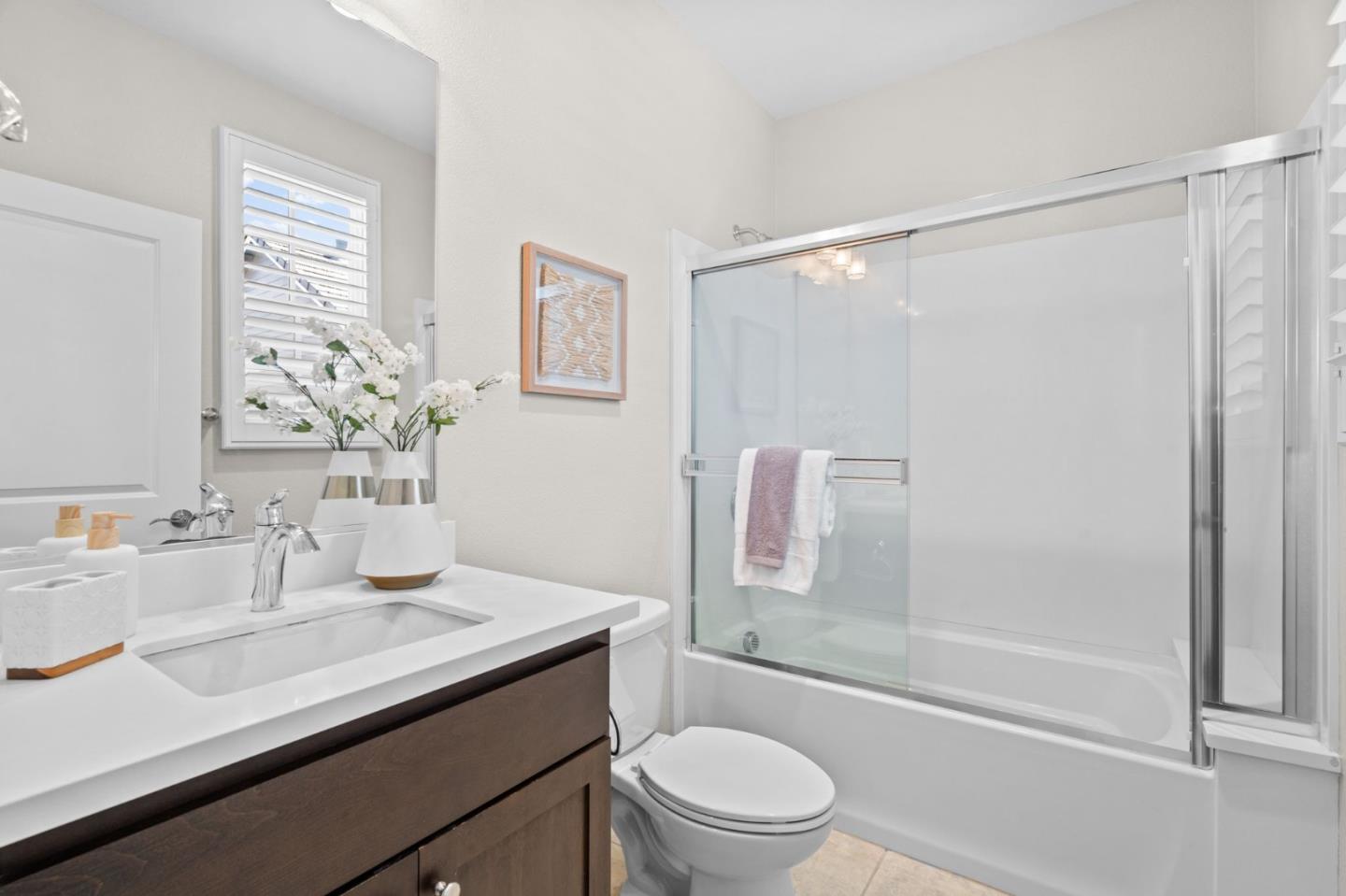 3406 Pyramid Way Mountain View, CA 94043 - Photo 23 of 41 a bathroom with a sink a toilet and shower