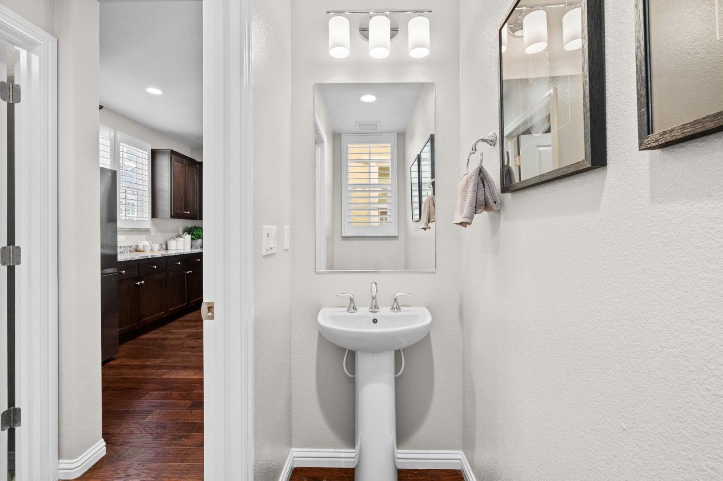 3406 Pyramid Way Mountain View, CA 94043 - Photo 27 of 41 a bathroom with a sink and a mirror