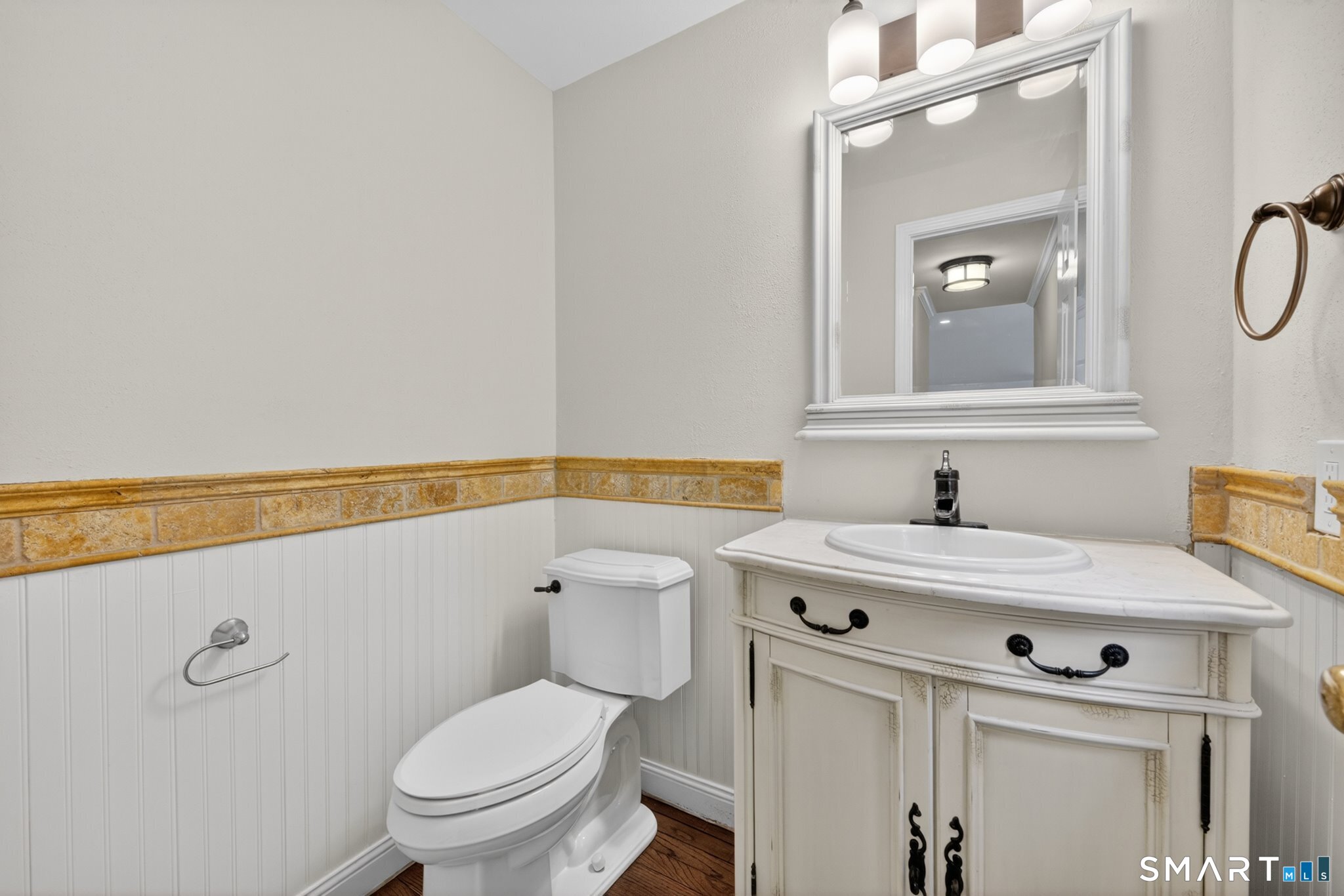 70 Barrack Hill Road Ridgefield, CT 06877 - Photo 9 of 32 a bathroom with a sink vanity mirror and toilet
