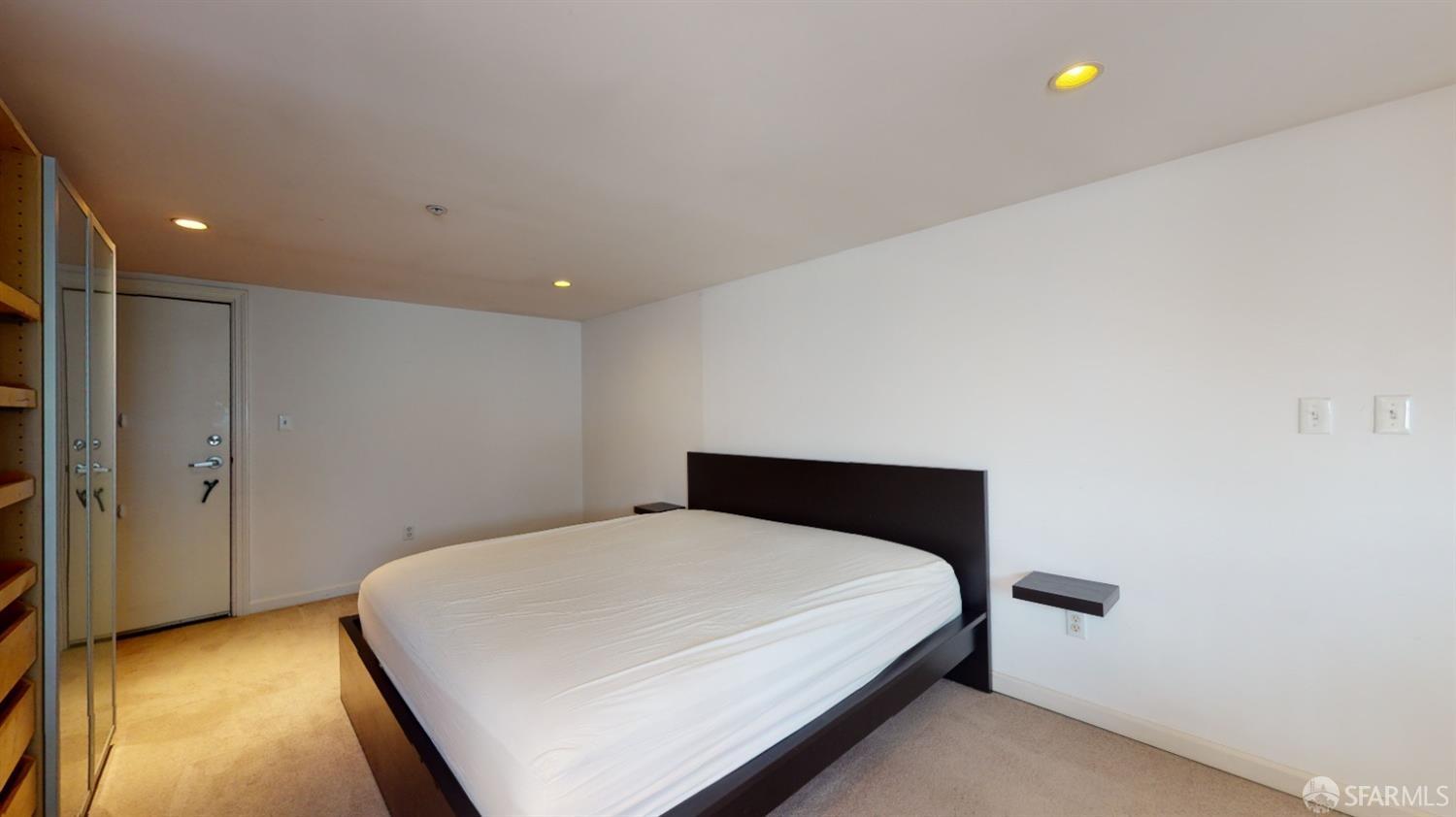 1578 Indiana Street, Unit 11 San Francisco, CA 94107 - Photo 19 of 23 a bedroom with a bed and a lamp