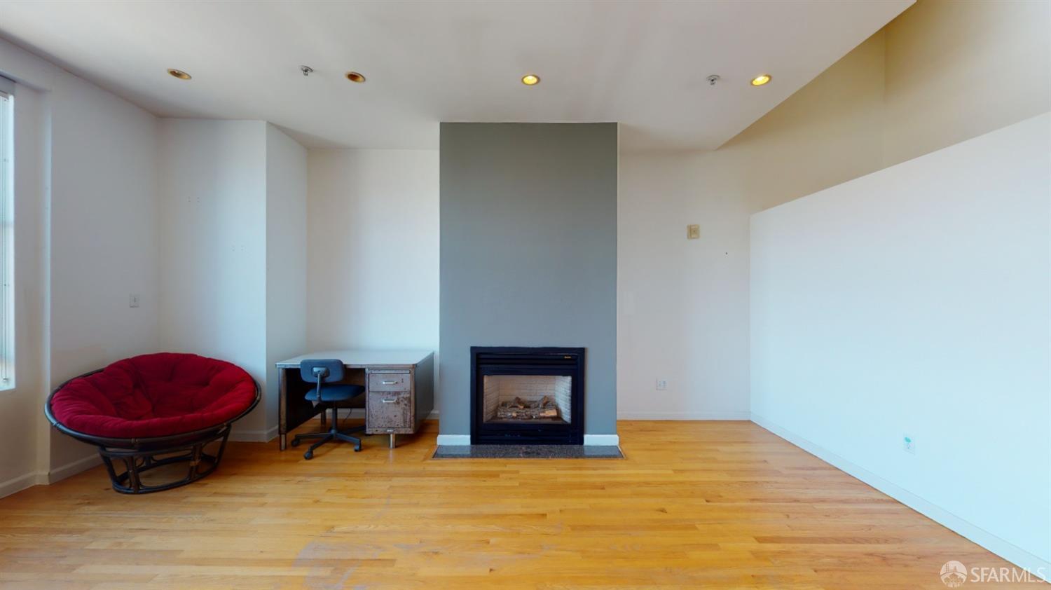 1578 Indiana Street, Unit 11 San Francisco, CA 94107 - Photo 2 of 23 a room with furniture and a fireplace