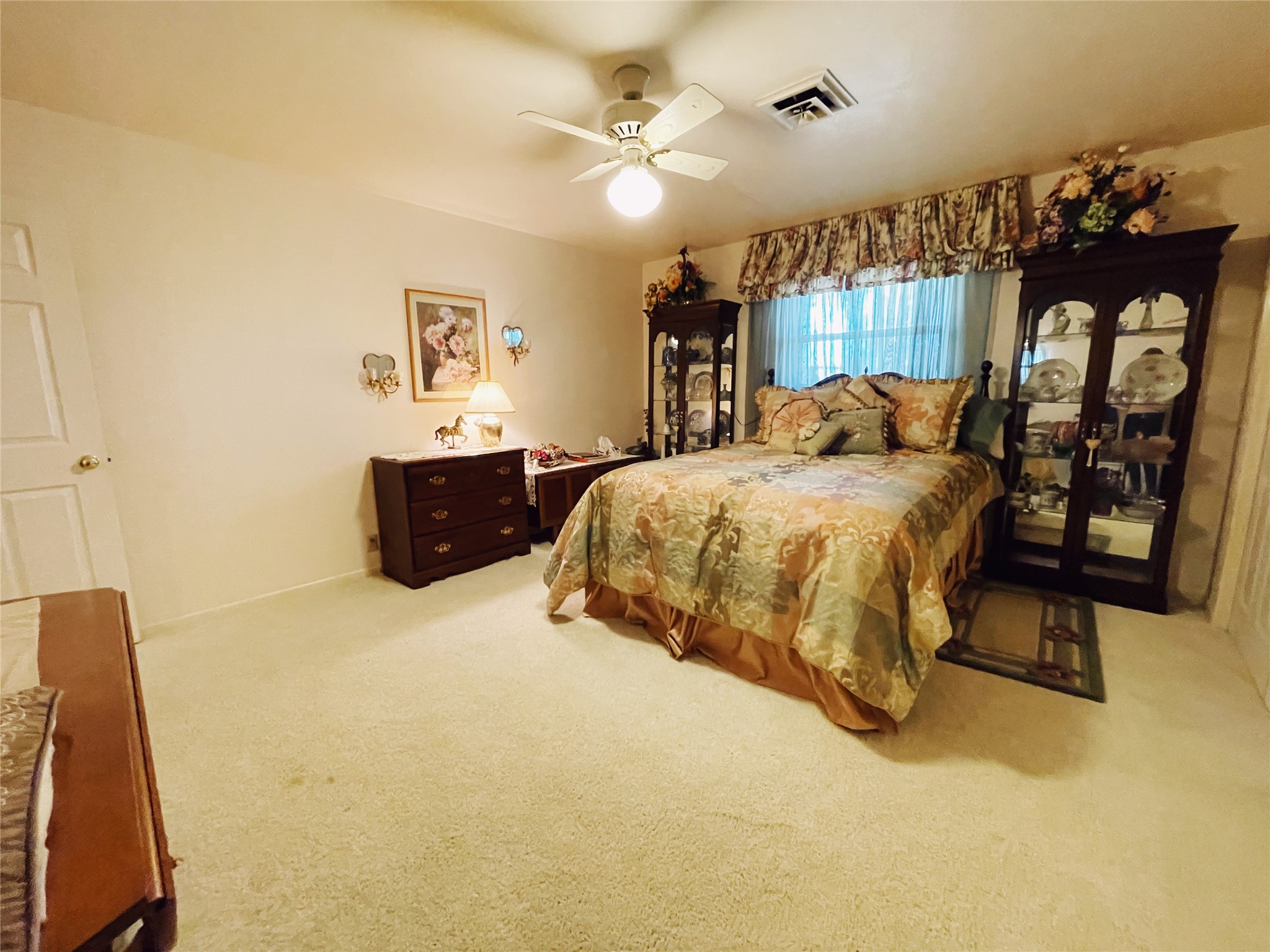 700 Shanklin Road Belton, TX 76513 - Photo 24 of 33 a bedroom with a bed mirror and a window