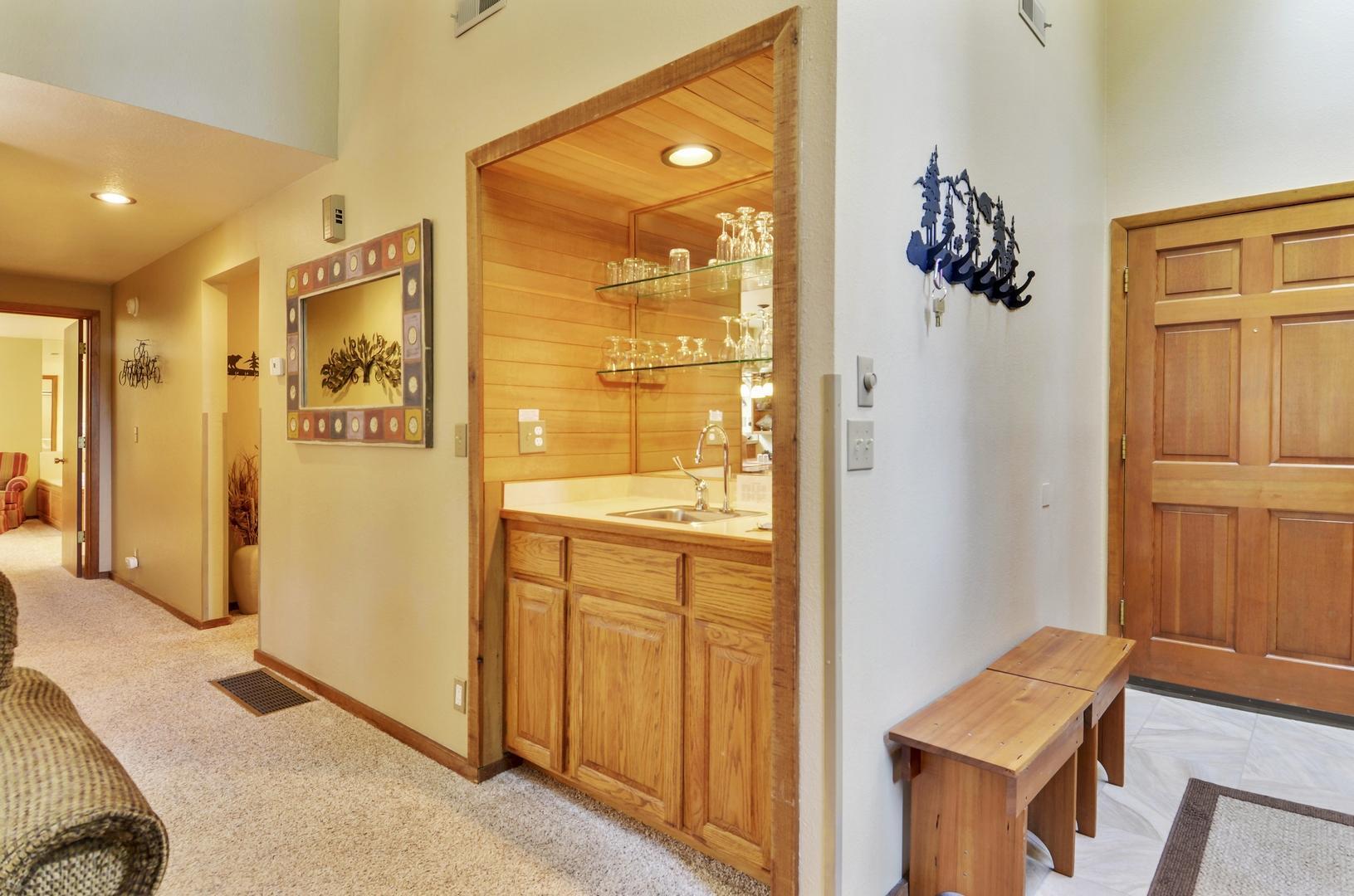 57301 Beaver Ridge Loop, Unit 10 Sunriver, OR 97707 - Photo 10 of 23 a view of a hallway with bathroom and wooden floor