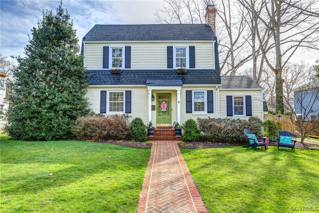 903 Baldwin Road Henrico, VA 23229 - Photo 1 of 46 a front view of a house with a garden and yard