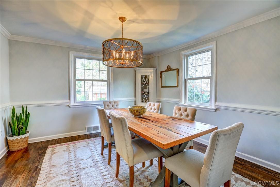903 Baldwin Road Henrico, VA 23229 - Photo 12 of 46 a view of a dining room with furniture window and wooden floor