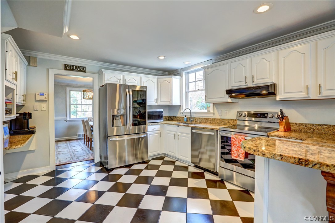 903 Baldwin Road Henrico, VA 23229 - Photo 16 of 46 a kitchen with stainless steel appliances granite countertop a refrigerator and a stove top oven