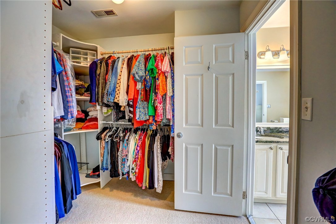 903 Baldwin Road Henrico, VA 23229 - Photo 36 of 46 a view of walk in closet with clothes