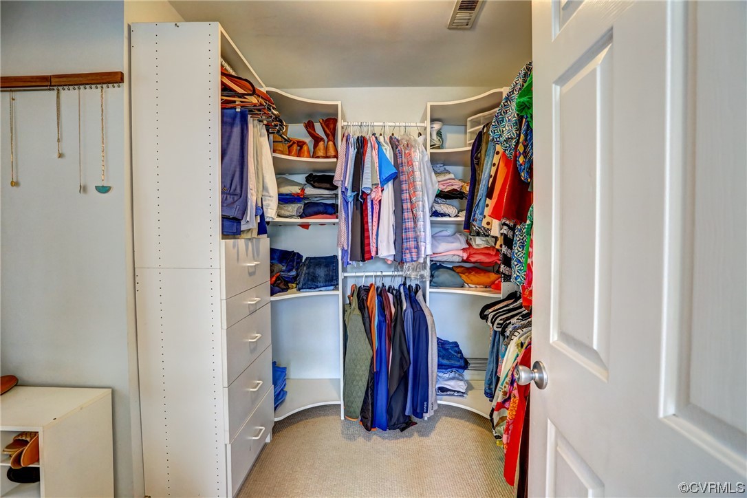 903 Baldwin Road Henrico, VA 23229 - Photo 37 of 46 a view of walk in closet with clothes
