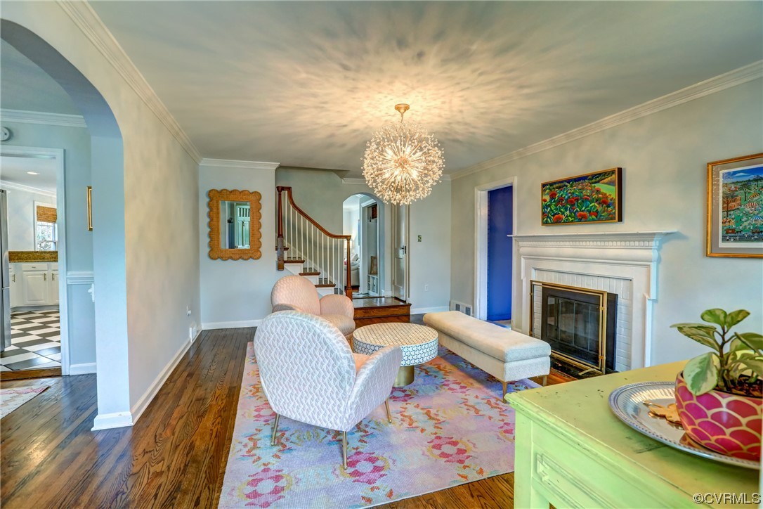 903 Baldwin Road Henrico, VA 23229 - Photo 7 of 46 a living room with fireplace furniture and a wooden floor