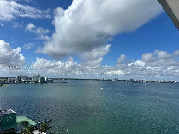 an empty room with large window