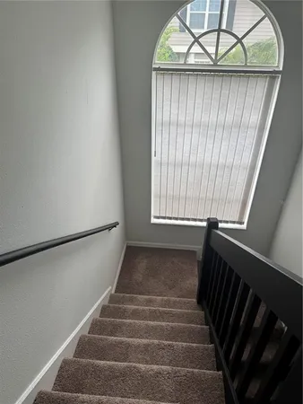 a view of a room with a hallway